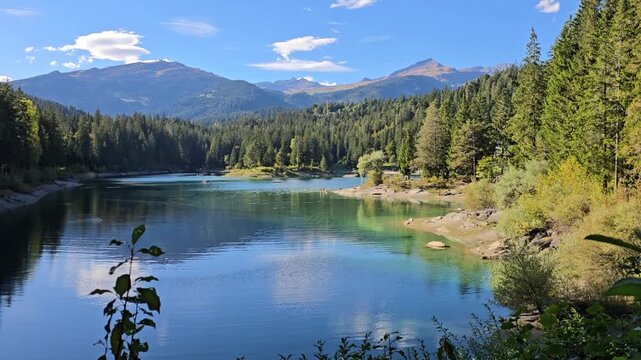 Scenic summer view of Lake Cauma near Films in the Canton of Graub&uuml;nden in Switzerland ideal for travel content