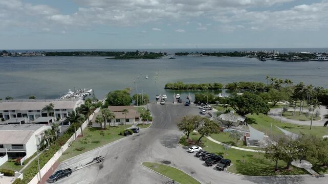 Drone flying over Harvey E. Oyer Jr. Park showing marina, docks and buildings.