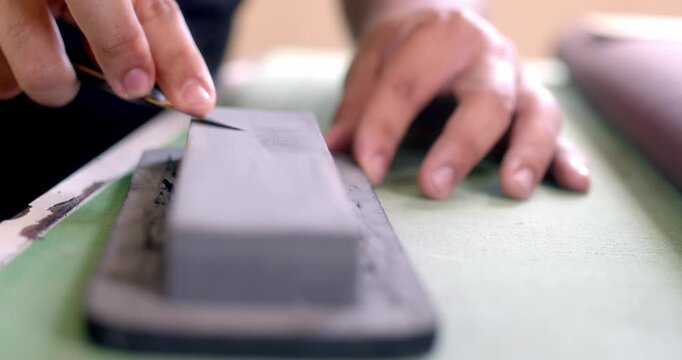 Artisan Sharpening Knife on Sharpening Stone, Brazil