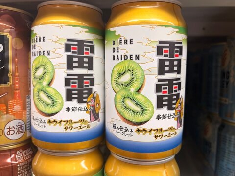 Biere de Raiden Kiwi Sour Ale cans on display at Shopping City Ariake Garden featuring traditional Japanese aesthetics and fruit illustrations - Tokyo, Japan, December 17, 2025