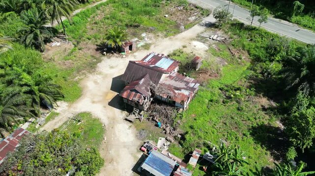 Circular aerial view on modest jungle home 4k drone