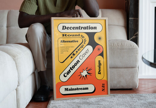 Mockup Of Man On Couch With Customizable Poster