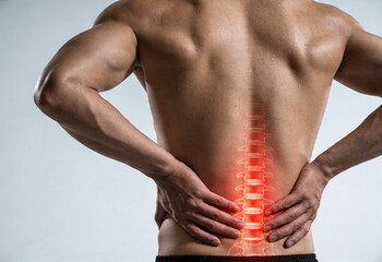 Obraz premium Inflammation highlighting lower back pain in adult anatomy, person health ache affecting body nerve.