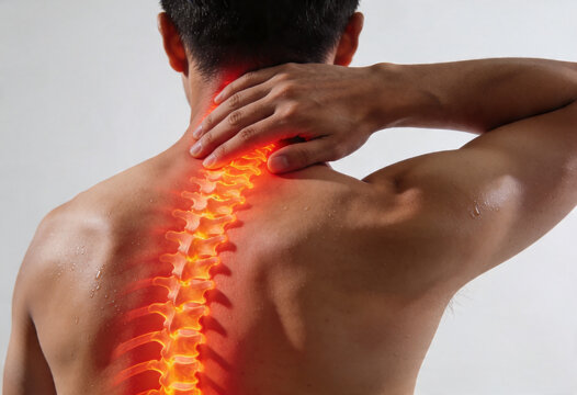 Man holding neck experiencing pain inflammation ache nerve cervical spine person health medicine backview anatomy.
