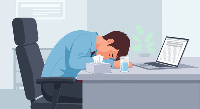Exhausted Office Worker Slumping Over His Desk Due To Illness or Fatigue Problems