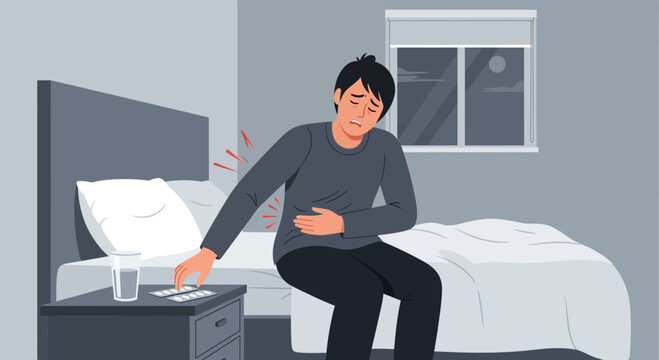 Feeling Unwell Seeking Relief: A Person Experiences Stomach Pain In Bedroom At Night