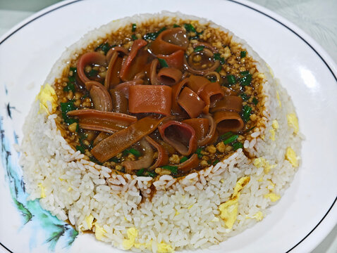 Chinese Urechis unicinctus (sea intestine) rice on plate