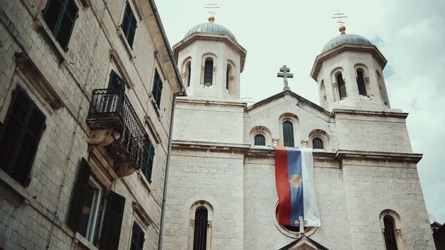Cinematic ground-level footage of Kotor featuring narrow stone streets, medieval architecture, cozy atmosphere, and Adriatic coastal charm.