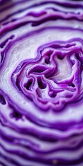 Obraz premium Macro view of sliced purple cabbage reveals vibrant texture and organic pattern for healthy food background , purple, cabbage
