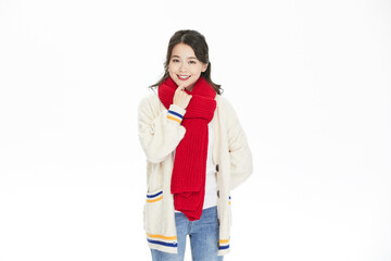 Fototapeta premium Smiling Young Woman in Red Scarf and Winter Cardigan