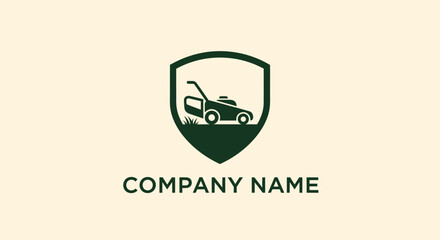 Obraz premium Lawn Mower within a Shield Logo Design for Gardening Services.