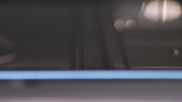 Close up of internal flatbed scanner components with soft lighting and blurred background
