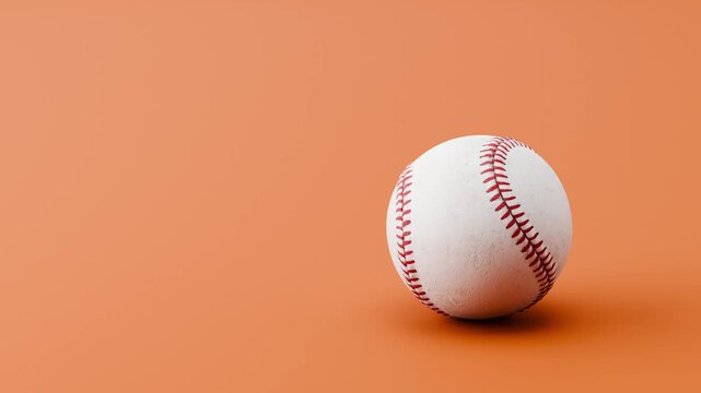 Baseball Ball Rolling Slowly from Left and from Right and Stopping on Clean Brown Orange Background with Copy Space