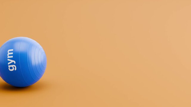 Fitness Ball Rolling Slowly from Left and Stopping on Clean Orange Background with Copy Space. Then it rolls back.