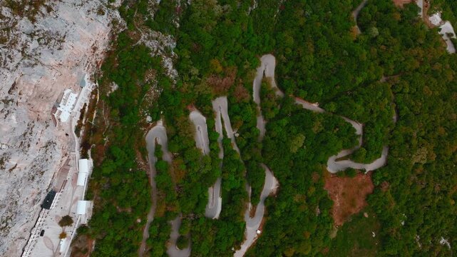 Cinematic footage of the famous Ostrog Monastery in Montenegro. Built into a dramatic cliffside, this iconic Orthodox monastery is one of the most important pilgrimage sites in the Balkans.