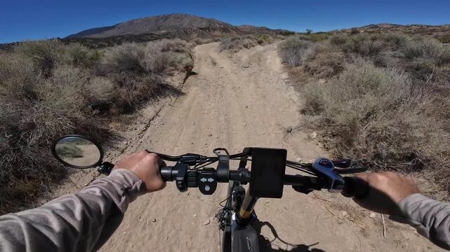 Dirt Bike and Electric Mountain Bike POV Shot of Hungry Valley Roadrunner Trail 1 Flat Road in Southern California USA