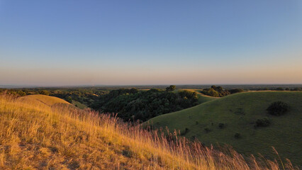 Naklejka premium Tranquil sunny summer landscape with green fields and hills in south-eastern Europe, Serbia.