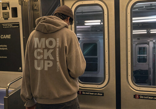 Beige Oversized Hoodie Mockup on Male Model in NYC Subway
