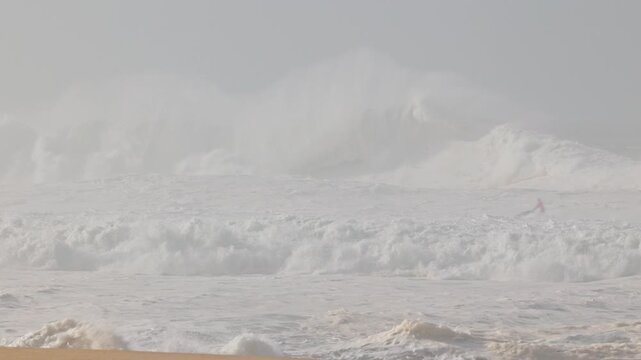 Big waves crushing in winter season in Nazare, Portugal