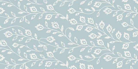 Fototapeta premium Seamless Pattern with Stylized Floral Motifs on a Light Blue Background.