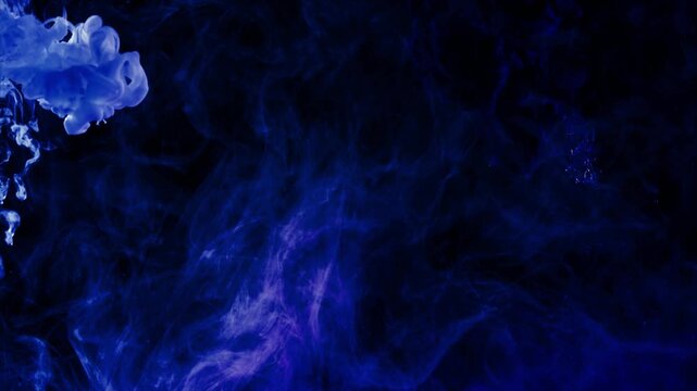 Smoke swirls in dark blue and purple hues