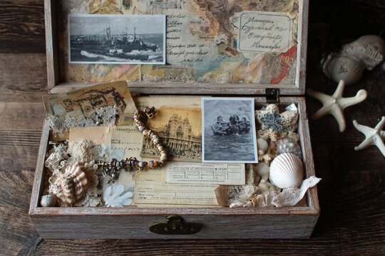 Vintage memory collage box with old photos and letters