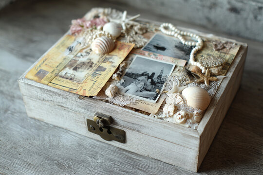 Vintage memory collage box with old photos and letters