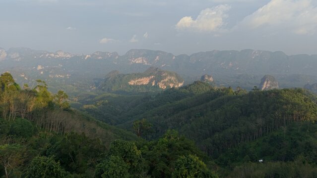 Doi ta pang viewpoint showcasing layered tropical forests and limestone mountains