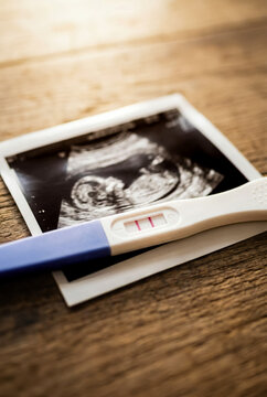 Positive pregnancy test on ultrasound photo