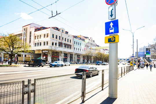 Road sign of speed camera and control at the intersection on city street.