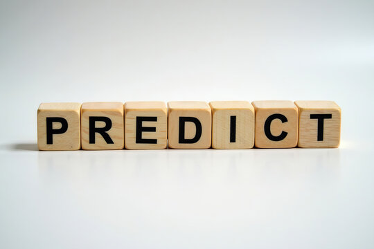 Analyzing Data and Predictive Modeling: Close-up of Wooden Blocks Spelling Predict on White Desk