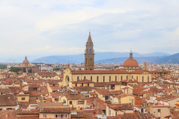 Fototapeta premium Panoramic view of Florence with rooftops and Basilica of the Holy Spirit, Tuscany, Italy