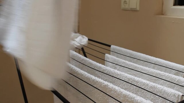 hanging laundry out to dry after washing