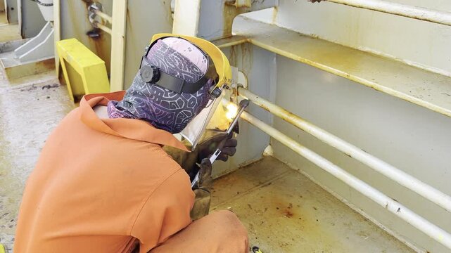 ship welder cut metal by fire cuter. autogenous flame. repairing job.