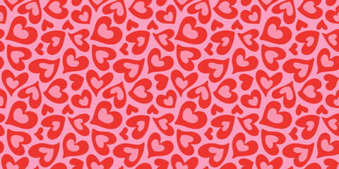 Naklejka premium Red heart pattern playful overlapping hearts on pink background