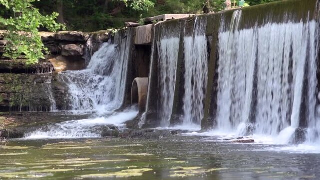 Built in 1962, this concrete dam is a mere 10 feet high but 190 feet long, playing a significant role in the water management of the region. 