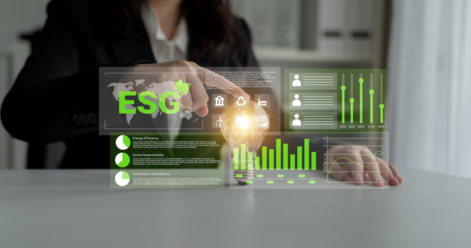 A business person interacts with a futuristic interface displaying ESG data metrics, highlighting the importance of sustainability and innovation in corporate decision-making. Gantry