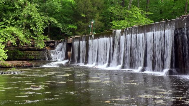 Built in 1962, this concrete dam is a mere 10 feet high but 190 feet long, playing a significant role in the water management of the region. 