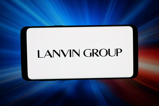 Stuttgart, Germany - 04-28-2026: In this photo illustration, the logo of Chinese luxury fashion company Lanvin Group is displayed on a smartphone in front of abstract background on computer screen.
