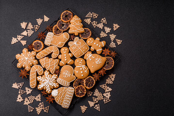 Fototapeta premium Christmas gingerbread, sweets and cookies for the festive table. Christmas gingerbread