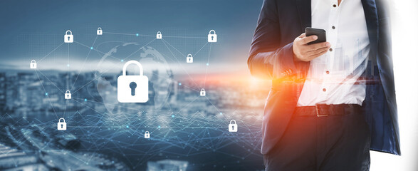 A businessman stands in a city setting, using his smartphone while cybersecurity icons highlight the importance of data protection and digital safety in modern life. Gantry © InfiniteFlow