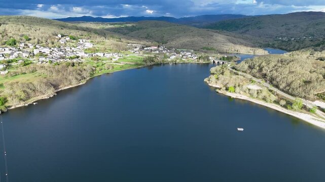Scenic aerial view of prada reservoir and a veiga village in spain