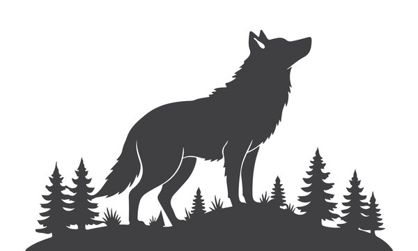 Silhouette of a wolf standing on a hill with trees