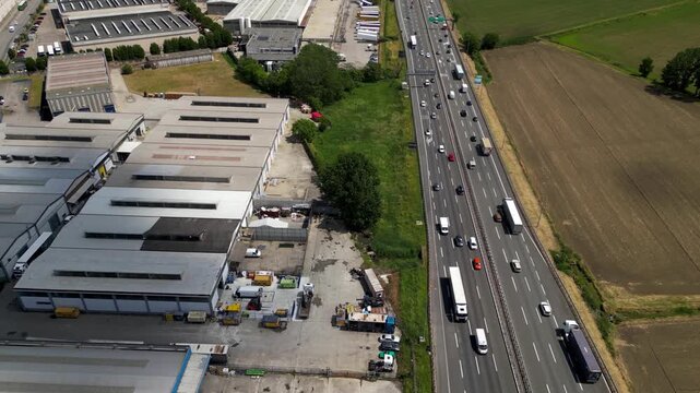 Industrial Zone and Highway: A comprehensive view showcases a bustling industrial zone adjacent to a busy highway. The photo highlights the intersection of commerce and infrastructure.