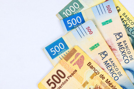 Mexican currency in form of banknotes bills denominations of 1000, 500, pesos.