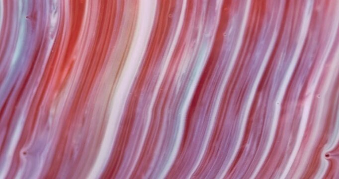 Abstract texture in red, white, purple tones. Ink space.