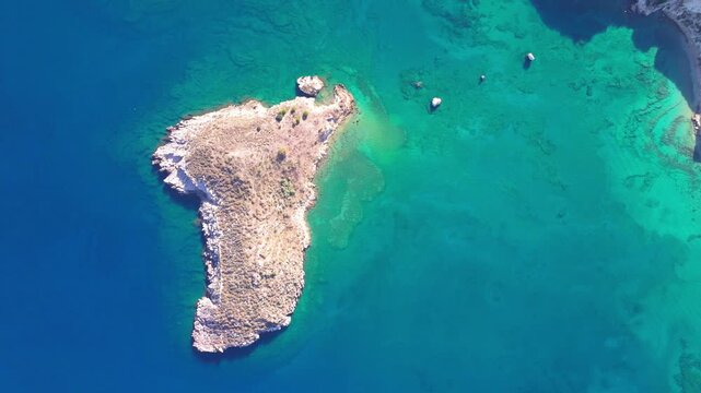 Aerial drone shot.View of famous beach in the summer, Crete, Greece. Famous beach with river and palm trees in Libyan sea. Tropical island, Panoramic view, Most beautiful beaches of Crete island