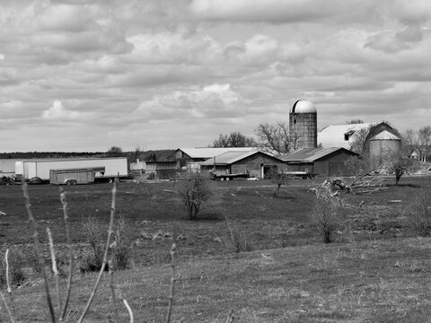 Old farm buildings on a farm on a spring day