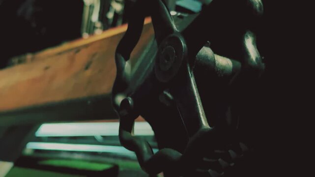 Close-up of handles and mechanisms on vintage textile machine