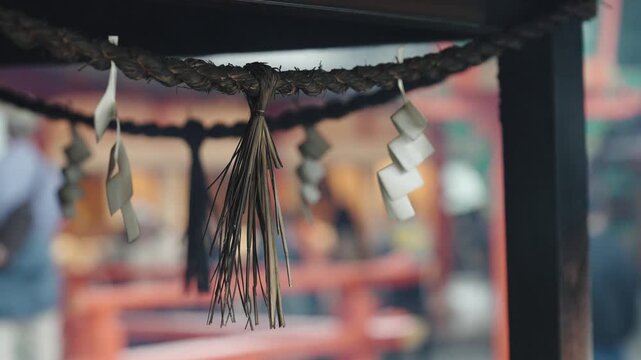 Sacred Shimenawa Rope with Shide at Japanese Shrine